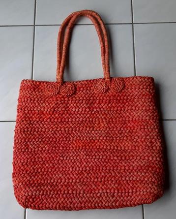 Oranje raffia handtas beschikbaar voor biedingen