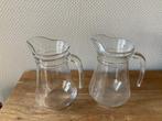 2 glazen karaffen, Enlèvement