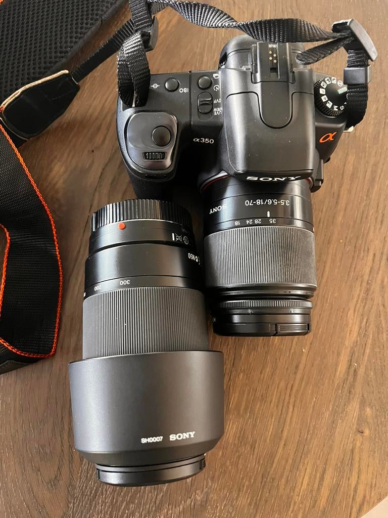 Spiegel reflex camera met flitser en zoomlens, Ophalen of Verzenden, Zo goed als nieuw