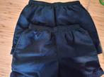 2 korte, blauwe sportbroeken maat 128/140, Kinderen en Baby's, Kinderkleding | Kinder-zwemkleding, Ophalen, Rucanor, Maat 128