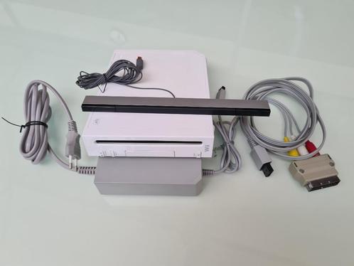 Wii spelcomputer + 4 dvd's + board, Games en Spelcomputers, Spelcomputers | Nintendo Wii, Zo goed als nieuw, Met 3 controllers of meer
