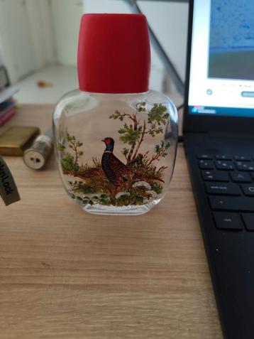 Vintage zakflesje beschikbaar voor biedingen