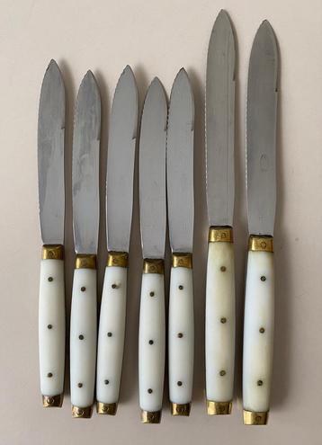 Antieke tafelmessen handvat ivoor met koper eindstukjes beschikbaar voor biedingen