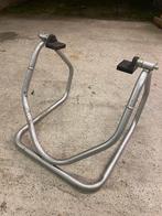 Motorstandaard paddock, Ophalen