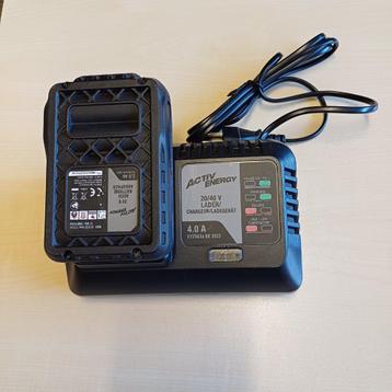 Oplader + batterij  beschikbaar voor biedingen