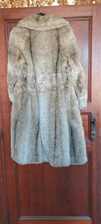 Manteau en fourrure, Enlèvement, Porté