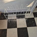 Wit schoenenrekje, Ophalen