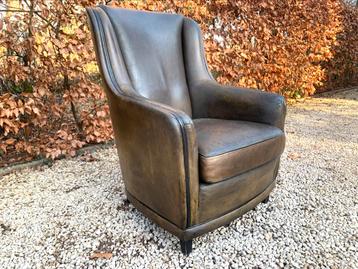 OPRUIMING: Wingback Fauteuil in het groen schapenleder.  beschikbaar voor biedingen