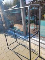 Rek voor kleren aan te hangen, Ophalen