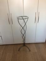 Bloempot of kaarsenhouder, Enlèvement