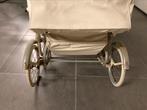 Antieke kinderwagen, Ophalen
