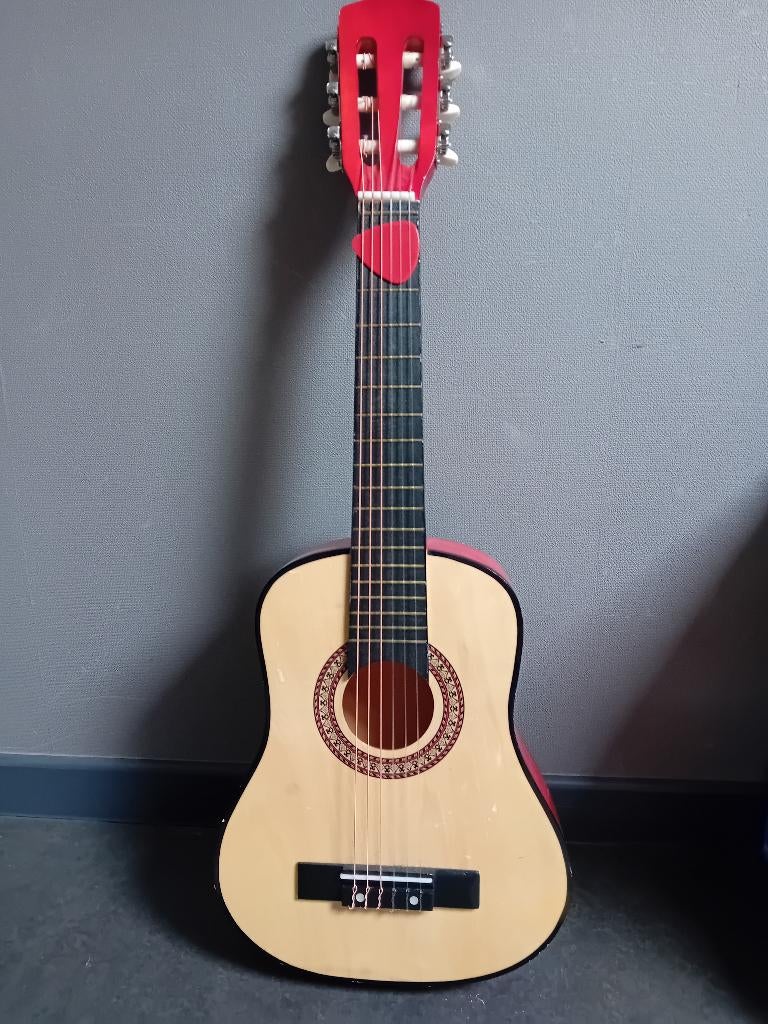 Speelgoedgitaar, Ophalen, Gebruikt