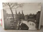 Grote fotokader Broeltorens Kortrijk, Ophalen