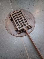 Wafelijzer open vuur, Enlèvement