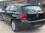 BMW 1 SERIE ✅114i GARANTIE CARPLAY GEKEURD, Auto's, 100 kW, 4 cilinders, Zwart, 1 Reeks