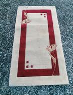 Tapis 150 cm longueur 80 cm largeur bon état général propre.