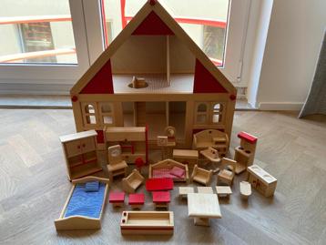 Goki houten poppenhuis met meubels beschikbaar voor biedingen