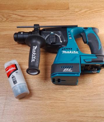 Makita Perceuse/ Marteau piqueur neuf  disponible aux enchères