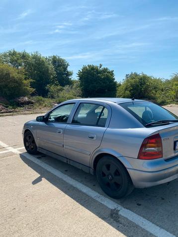 Opel Astra Twinport 1.6 Benzine 2003, Auto's, Zwart, 4 cilinders, Elektrische ramen, 1600 cc