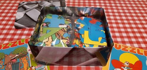 2 kinderpuzzels in metalen doos, Kinderen en Baby's, Speelgoed | Kinderpuzzels, Zo goed als nieuw, 2 tot 4 jaar, Meer dan 50 stukjes