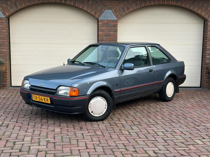 Ford Escort 1.3 Bravo geheel origineel 145.000km 1e eigenaar, Auto's, Ford, Particulier, Radio, Benzine, Handgeschakeld, Blauw