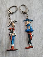 2 sleutelhangers Lucky Luke OMO kunststof '60s, Verzamelen, Ophalen of Verzenden