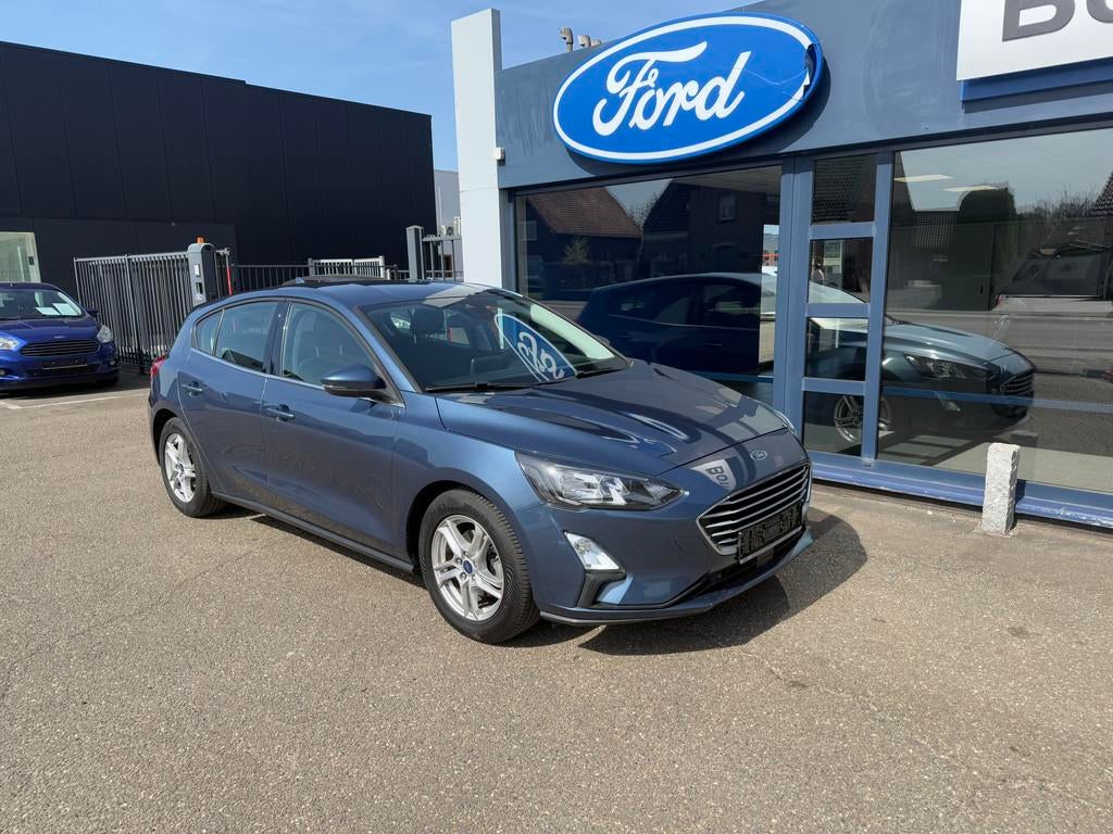 Ford Focus Connected 5D 1.0I MHEV 125PK M6, Auto's, Stof, Gebruikt, Blauw, Bedrijf