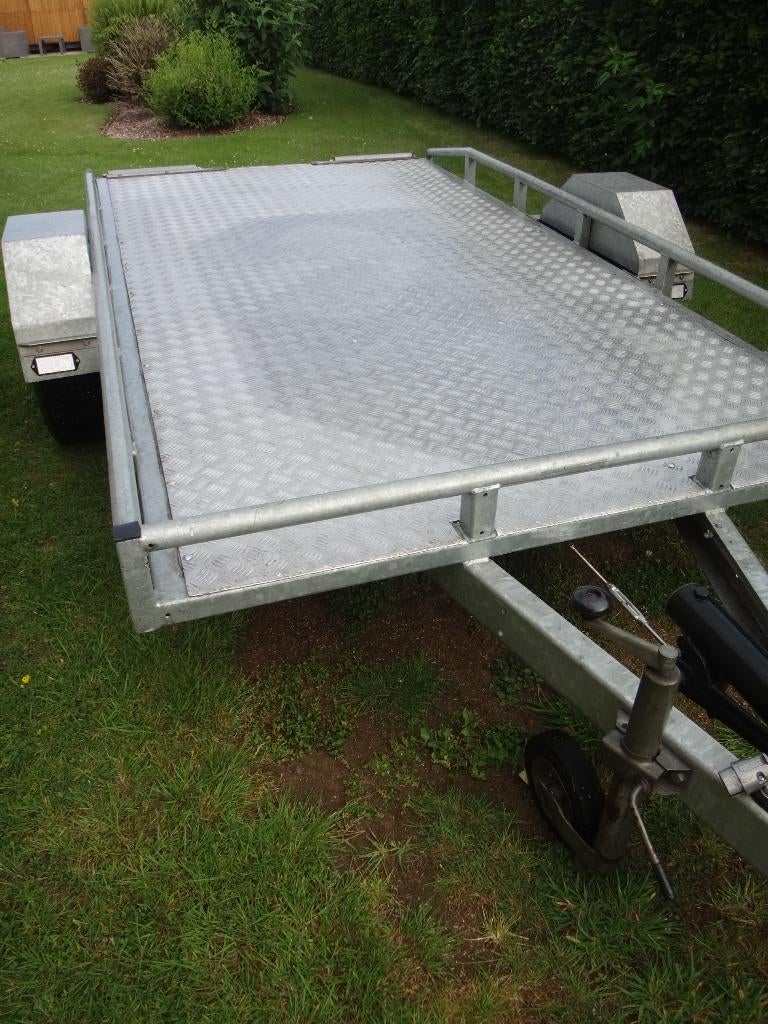 Platte aanhangwagen, Ophalen, Gebruikt