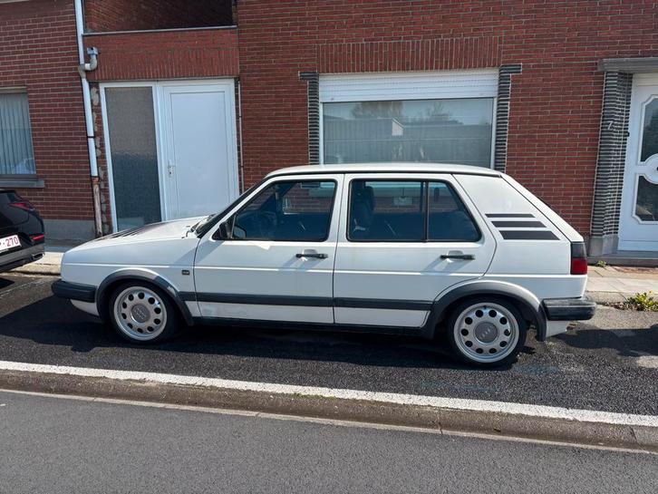 Golf 2 1300cc, Auto's, Volkswagen, Particulier, Golf, Benzine, Stadsauto, 5 deurs, Handgeschakeld, Wit, Zwart, Kunstmatig leder