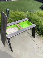 Exit zand/water/picknick tafel met deksel, Ophalen