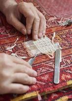 Restauration de tapis, Enlèvement