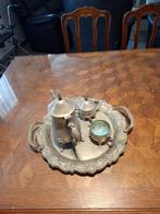 Tinnen thee set voor tafelopstelling, Ophalen