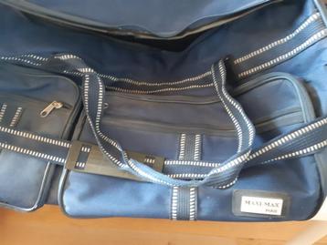 Grand Sac voyage bleu à roulettes (valise).  beschikbaar voor biedingen
