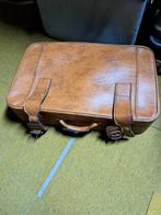 Vintage reiskoffer, Enlèvement