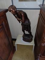 houten beeld, Ophalen