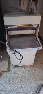 Brood snij machine, Ophalen