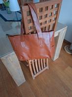 Nieuwe handtas, Ophalen