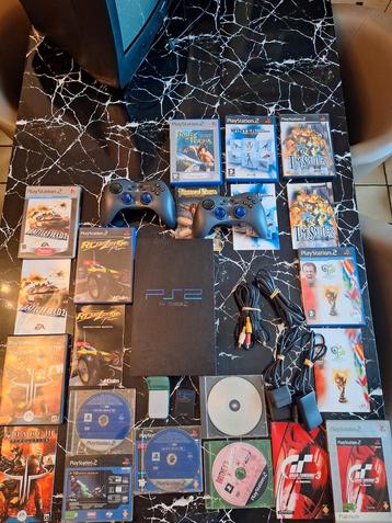 Console Sony Playstation 2 + 8 jeux + 2 Memory Card + 2 Mane