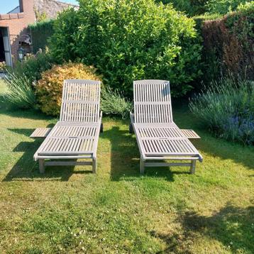 Twee teakhouten ligstoelen + kussens  beschikbaar voor biedingen