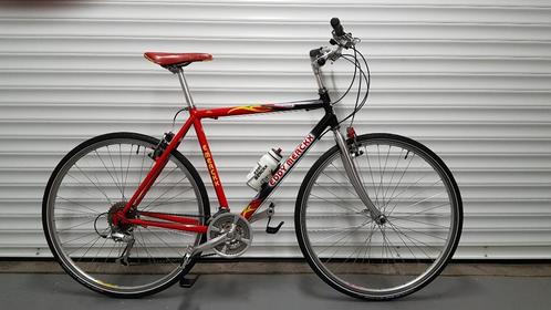 Eddy Merckx Trekking sportfiets Kleur: rood, geel, zwart, Fietsen en Brommers, Fietsen | Racefietsen, Zo goed als nieuw, Heren