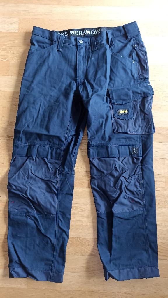 Snickers Workwear 54 en 56 blauwe werkbroeken — nieuw, Tuin en Terras, Werkkleding, Nieuw, Heren, Broek, Ophalen