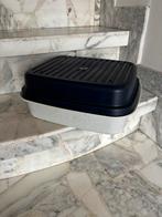 Grote Tupperware brooddoos, Ophalen