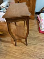 Hoger bijzettafeltje of plantenstaander, Ophalen