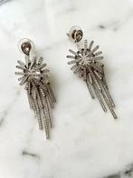 Zilverkleurige oorbellen van Swarovski, Met kristal, Overige materialen, Hangers, Ophalen of Verzenden