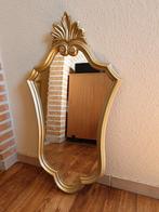 Decoratieve spiegel in goudkleur ., Ophalen
