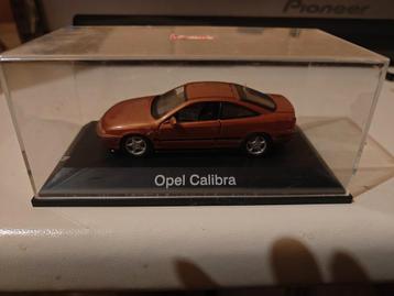 Schuco Opel Calibra oranjemetalliek 1/43 beschikbaar voor biedingen