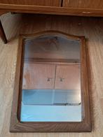 Spiegel met houten kader, Enlèvement