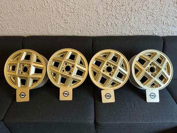 4 jantes alu 4x100 en 5 1/2J14" et 4x caches centraux OPEL.  beschikbaar voor biedingen
