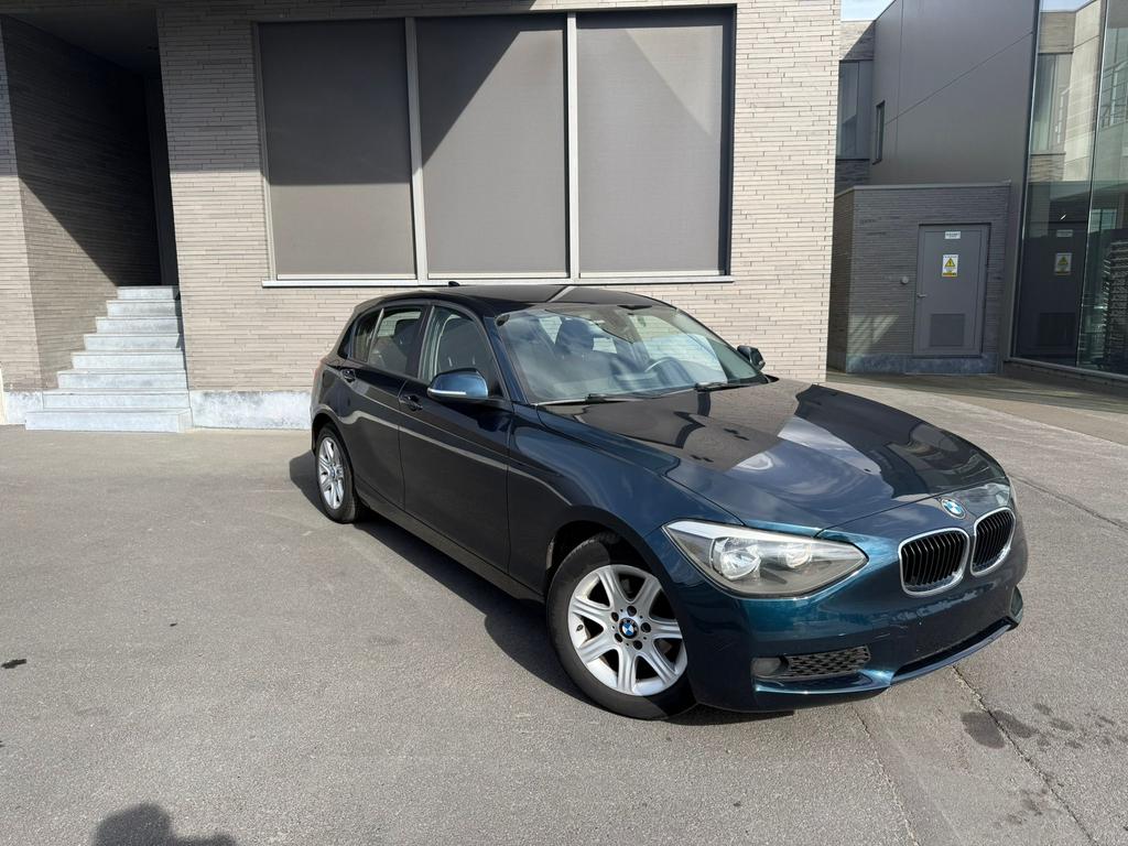 BMW 116i 2012 | 166.000km | Benzine, Auto's, BMW, 100 kW, Zwart, Blauw, Bedrijf