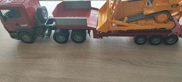 bruder scania trekker oplegger met cat bulldozer beschikbaar voor biedingen